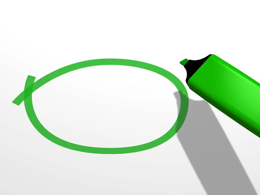 A green marker with a circle in green marker.