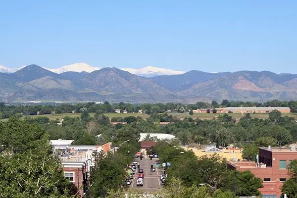 A view of Littleton, Colorado in the spring against mountains in the background. Obtaine from https://www.littletonco.gov//