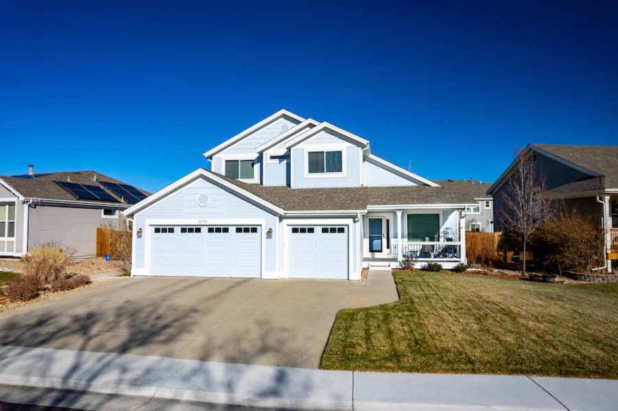 Exterior photo of a light blue painted home near Denver, CO 