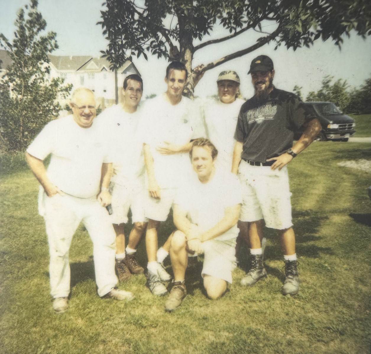 Early Imhoff Painting Company crew standing on a lawn during the Minnesota years